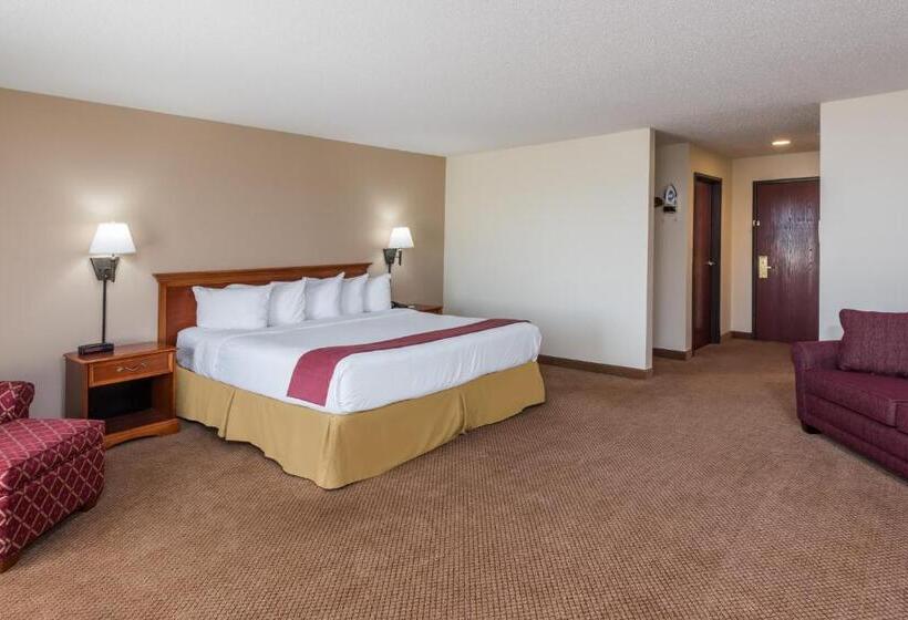 キングサイズベッドのデラックススイート, Seasons Inn & Suites Highland