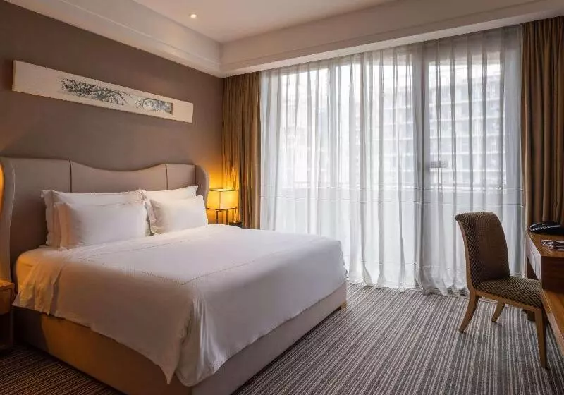 キングサイズベッドのデラックスルーム, Pullman Foshan Shunde