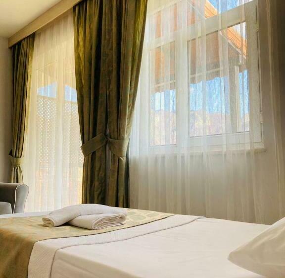 Quarto Estandar, Bybassios Orhaniye