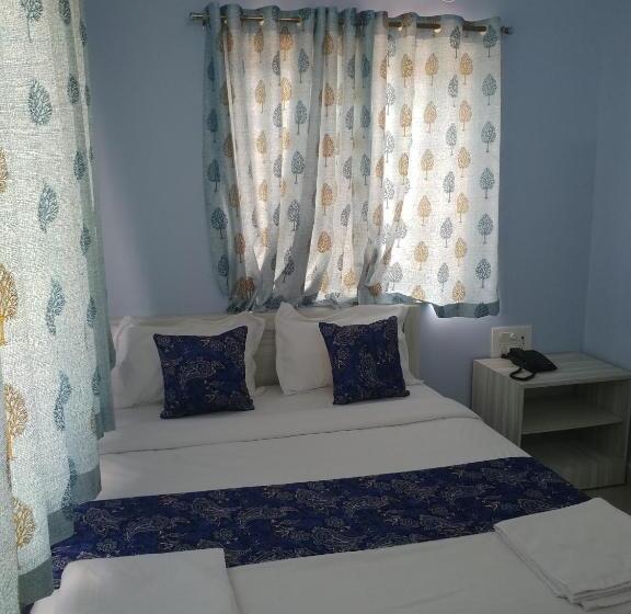 חדר דלוקס, Sai Inn Mysore