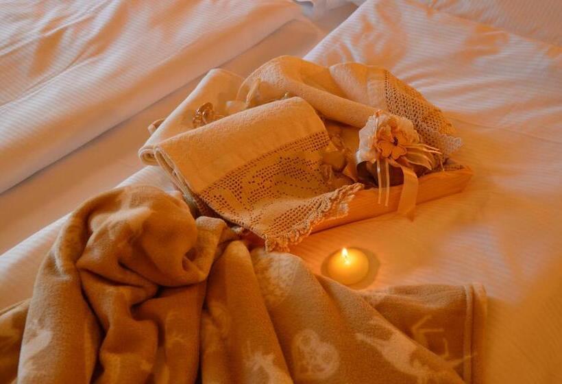 スイート, Garnì Carpe Diem