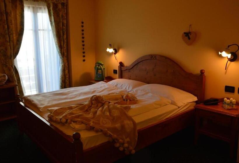 スイート, Garnì Carpe Diem