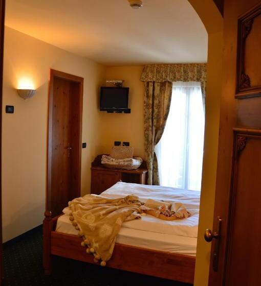 スイート, Garnì Carpe Diem