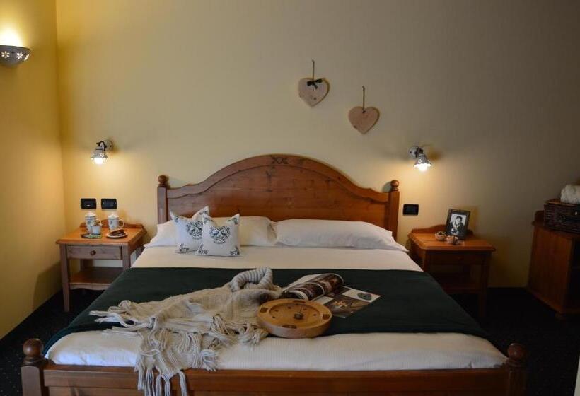 スイート, Garnì Carpe Diem