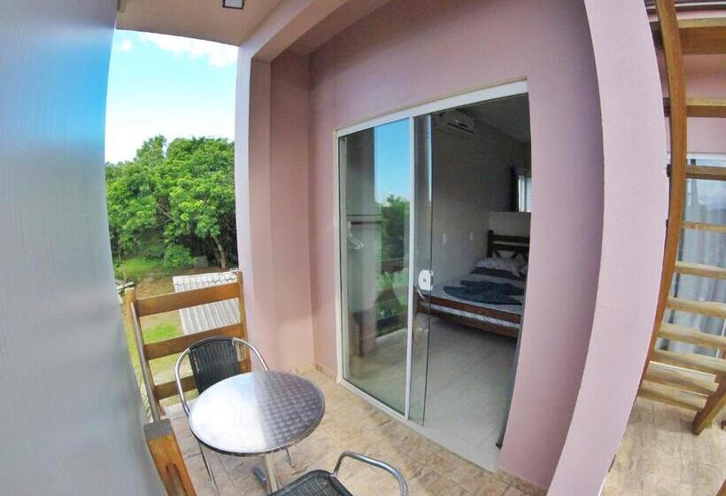 Quarto Estandar, Origin Acomodações