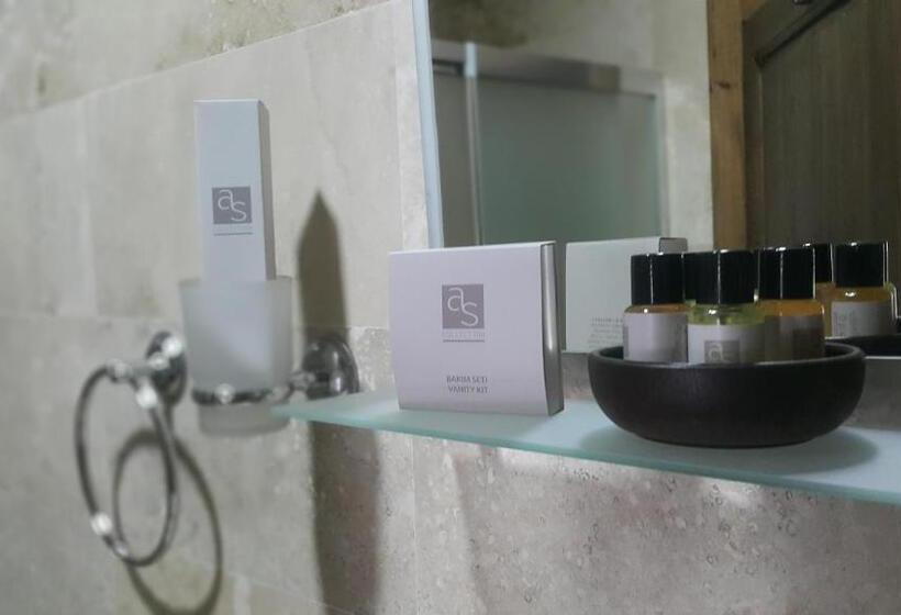 デラックストリプルルーム, Guzide Cave