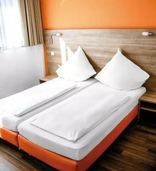 コンフォートルーム, Orange Hotel Und Apartments