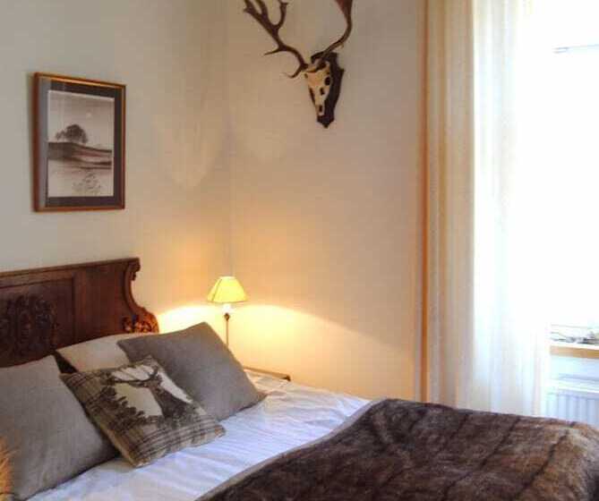 Quarto Estandar, Strand