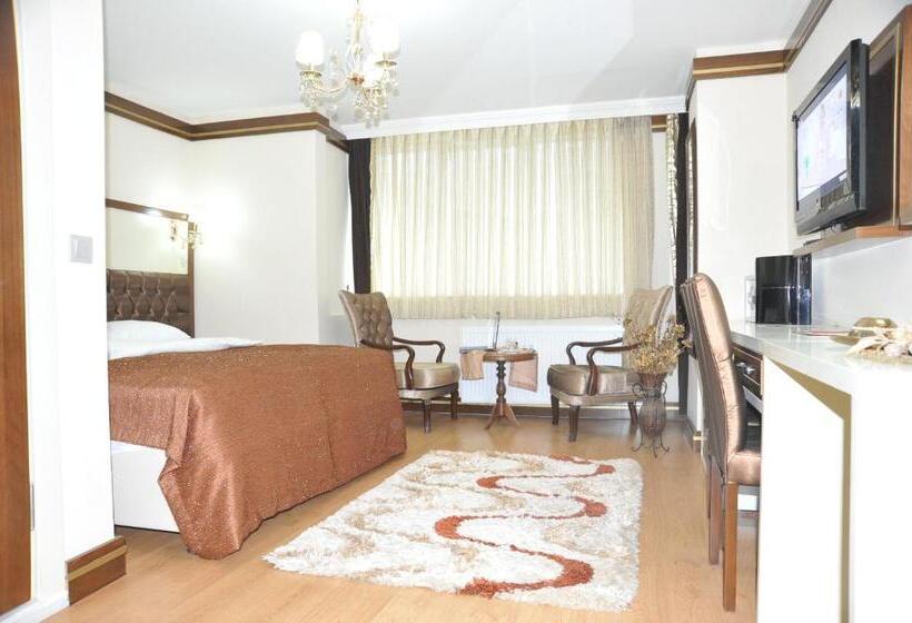 اتاق لوکس یک تخته, Gloria Tibi