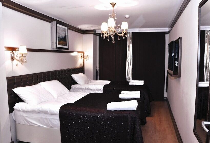 اتاق استاندارد, Gloria Tibi