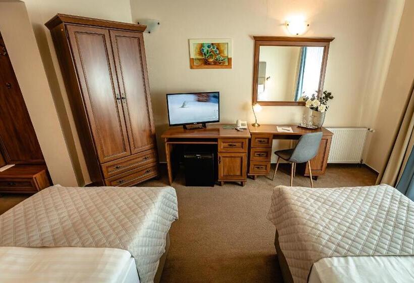 Quarto Comfort, Dixon