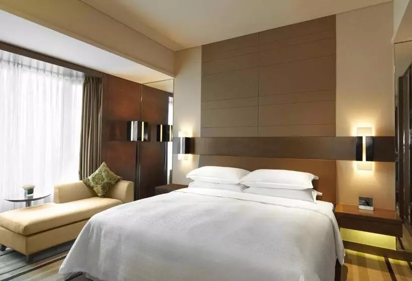 キングサイズベッドのデラックスルーム, The Qube Hotel Yangzhou