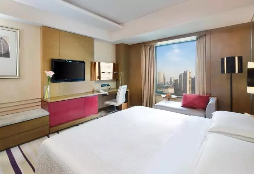 キングサイズベッドのデラックスルーム, The Qube Hotel Yangzhou
