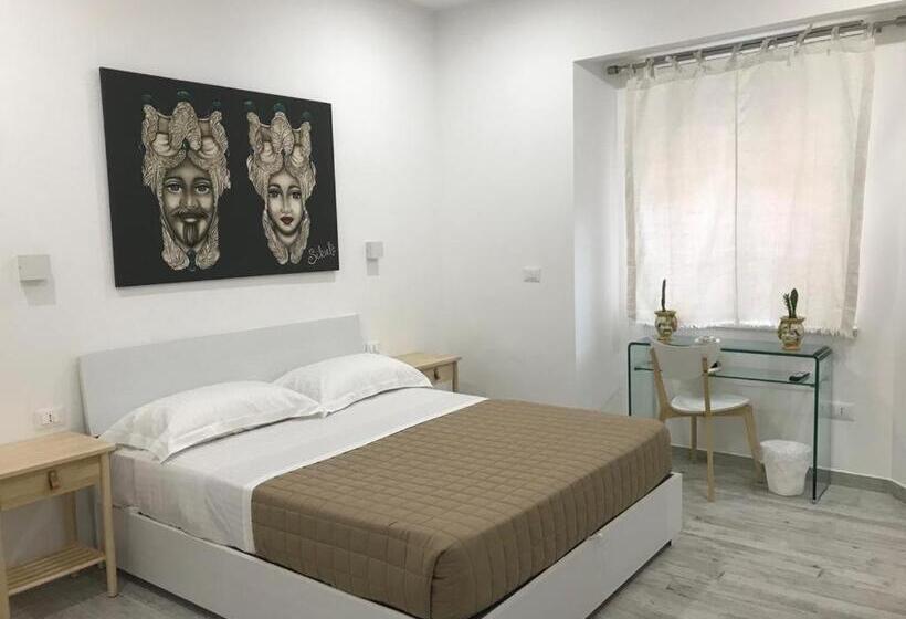 デラックスルーム, Sikulè