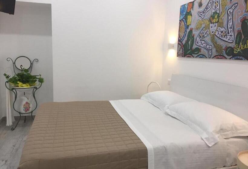 キングサイズベッドのスタンダードルーム, Sikulè