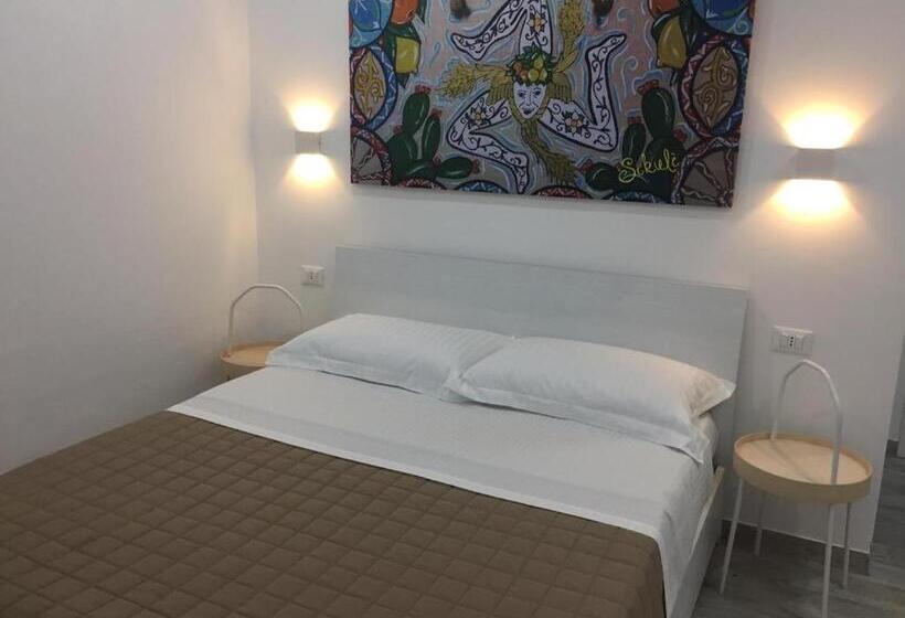 キングサイズベッドのスタンダードルーム, Sikulè