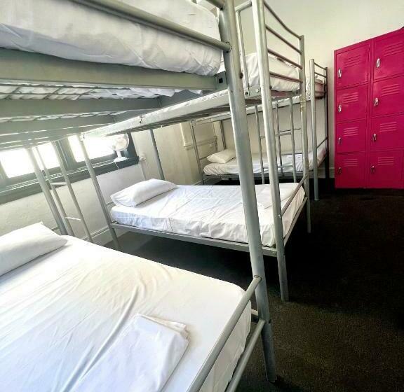 Bed in Shared Room with Shared Bathroom, The Downing Hostel