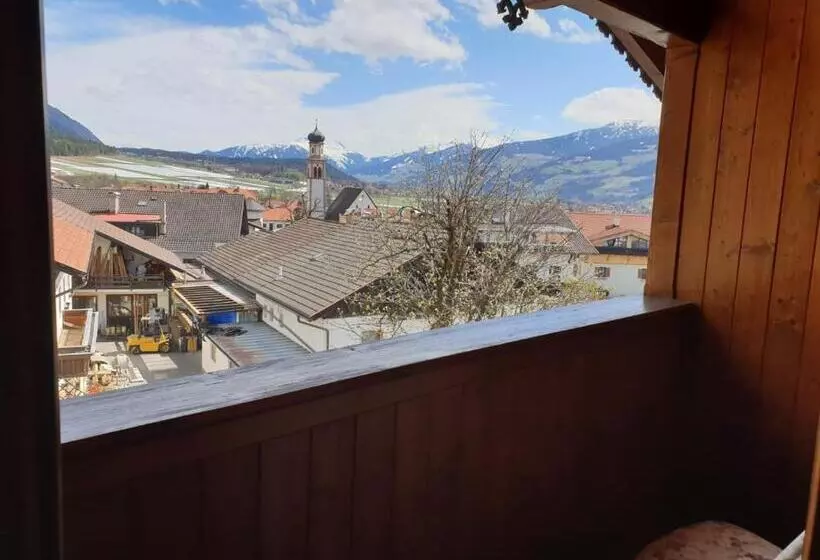 Camera Tripla Classica con Balcone, Purner