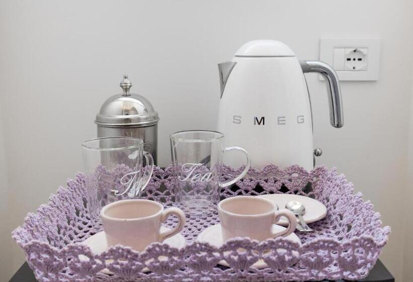 חדר סטנדרט לשלושה עם נוף לגינה, Palazzo Cacace Relais