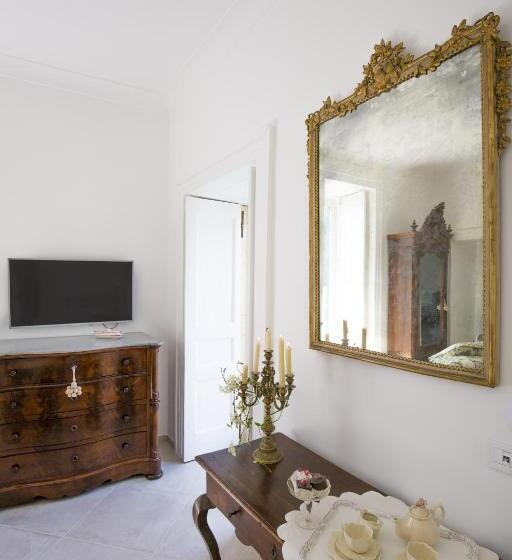 חדר סטנדרט לשלושה עם נוף לגינה, Palazzo Cacace Relais