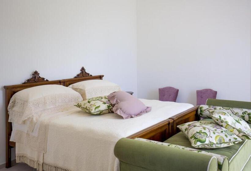 חדר סטנדרט לשלושה עם נוף לגינה, Palazzo Cacace Relais