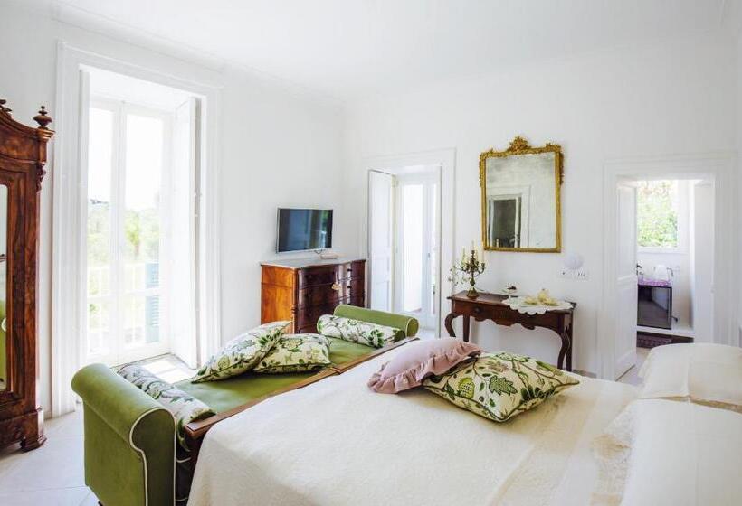 חדר סטנדרט לשלושה עם נוף לגינה, Palazzo Cacace Relais