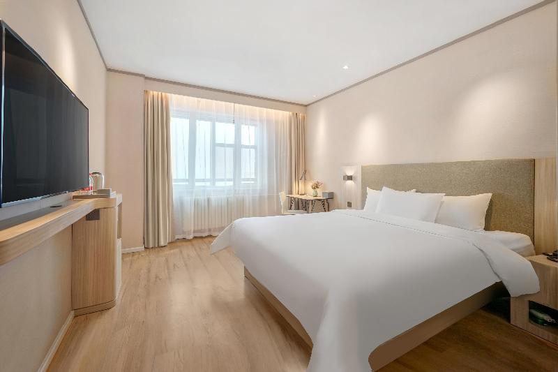 Quarto superior, Hanting  Harbin Railway Station Square