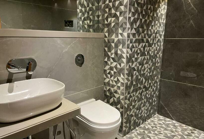 غرفة ديلوكس, Suvidha Suites