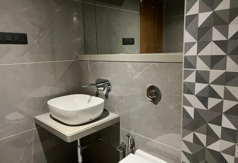 غرفة ديلوكس, Suvidha Suites