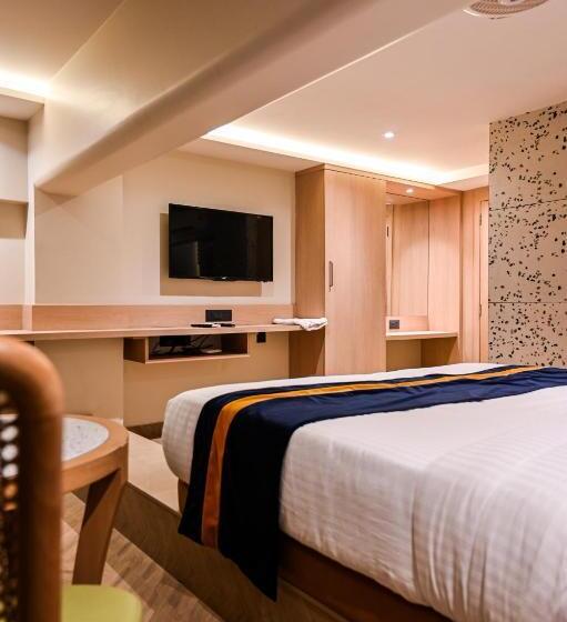 غرفة ديلوكس, Suvidha Suites