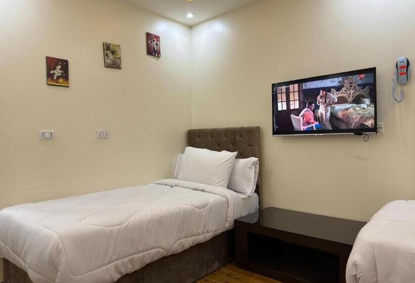 اتاق استاندارد چهار تخته, Pyramids Gardens Hotel   فندق حدائق الاهرام