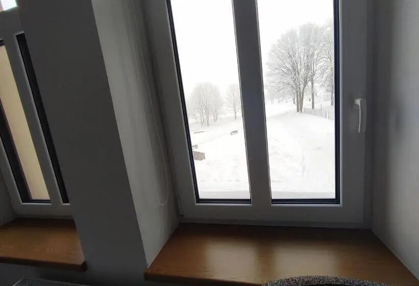 デラックスルーム, Poutní Dům