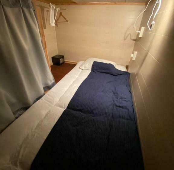 سرير فى غرفة مشتركه, ゲストハウス喜舎場