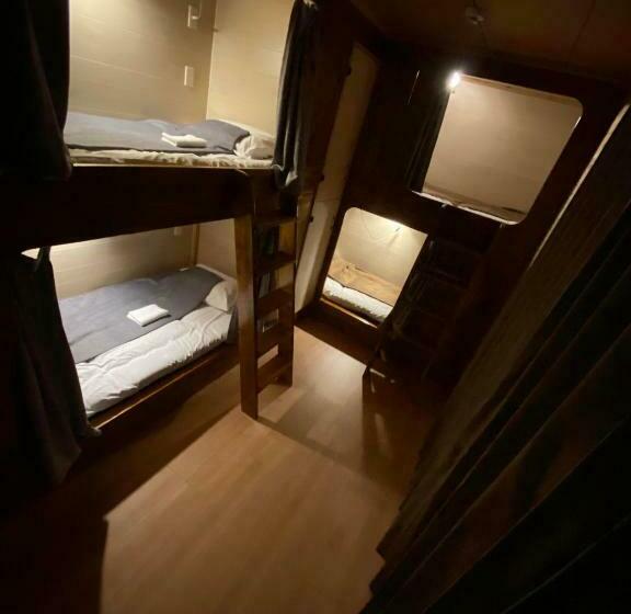 سرير فى غرفة مشتركه, ゲストハウス喜舎場