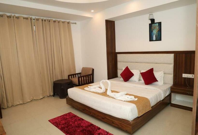 キングサイズベッドのスタンダードルーム, Cordelia Inn By Devpaga Hotels Pvt Ltd