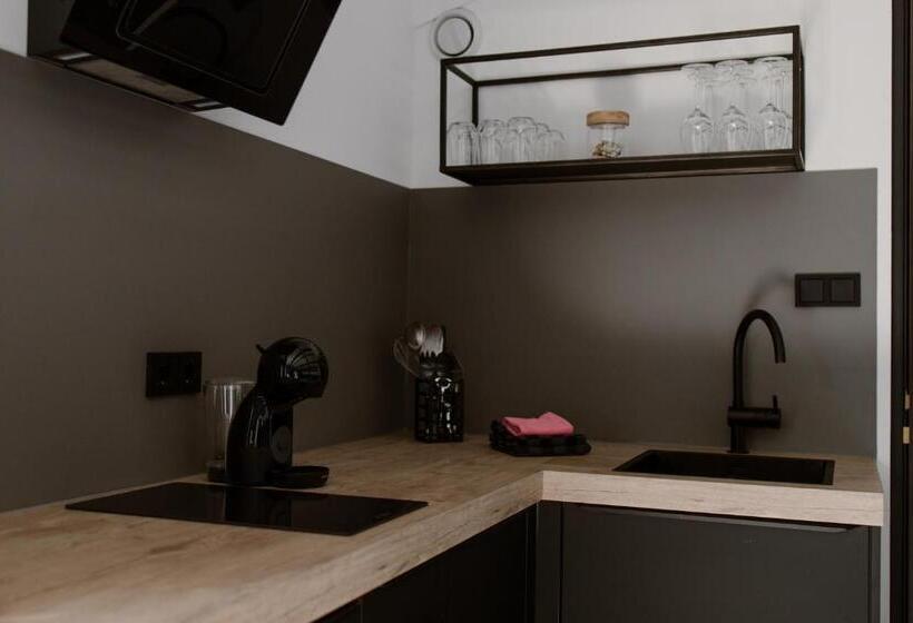 סטודיו משפחתי, De La Rue Vakantiesuites