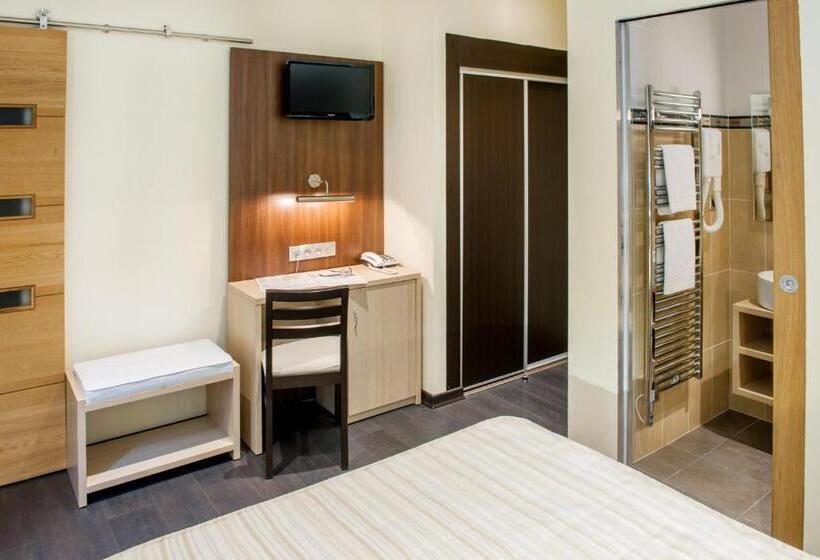 غرفة قياسية ثلاثية, Hôtel La Source