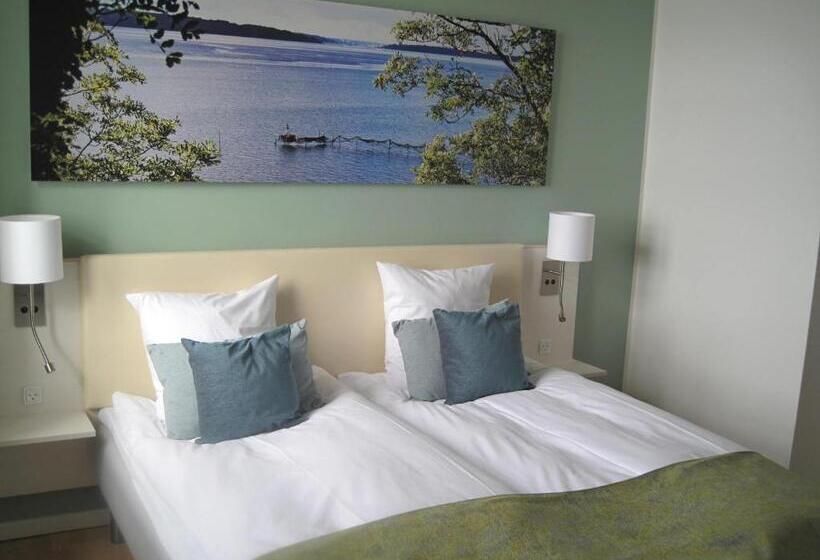 带海景的标准房, Sixtus Sinatur Hotel & Konference