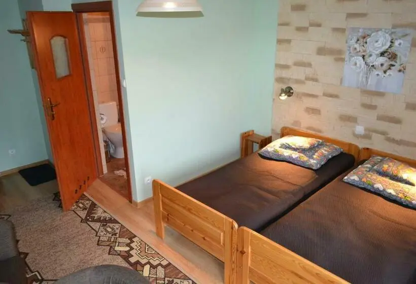 Deluxe Kolmen Hengen Huone, Koliba
