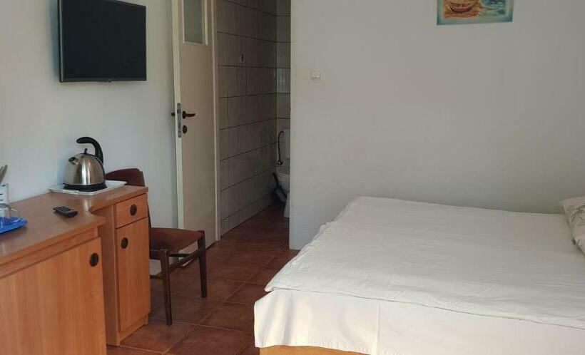 标准房带园景, Wynajem Pokoi