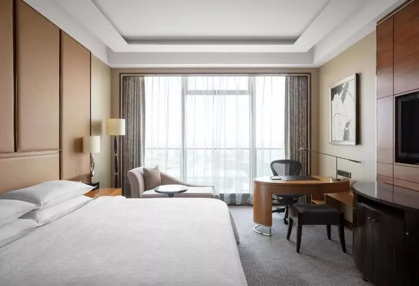 キングサイズベッドのデラックスルーム, Sheraton Qingdao Jiaozhou