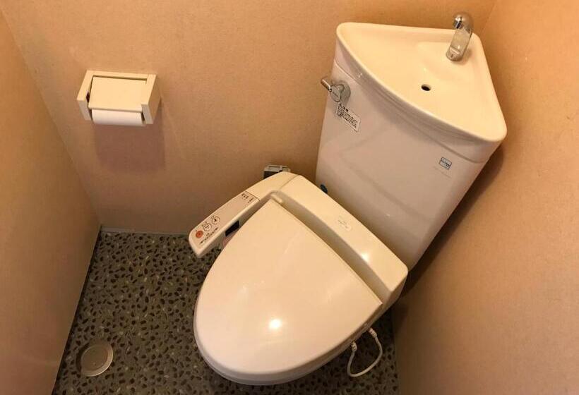 バスルーム共有のトリプルスタンダード, Ikoi No Ie