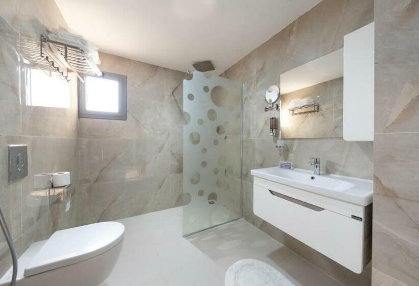 חדר משפחתי דלוקס, فندق الرؤية الجديدة