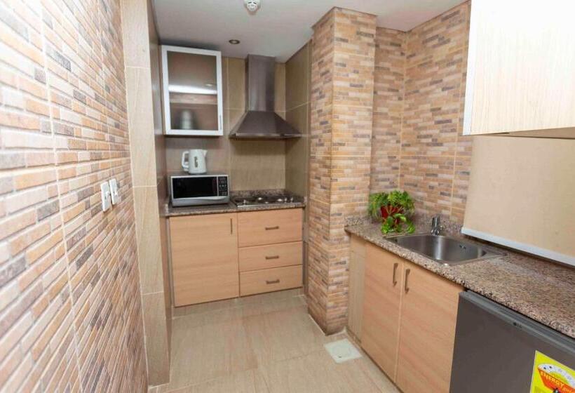 Люкс Кровать Кинг, Roots Apartment