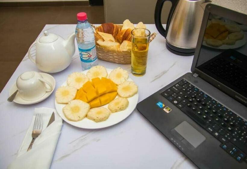 سوییت با چشمانداز باغ, Hôtel Guest House Quatre Saisons