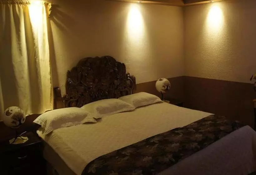 キングサイズベッドのデラックスルーム, Posada Y Spa Jade Teotihuacan