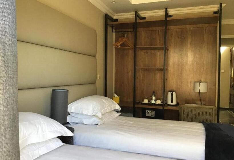 اتاق اکونومی, The Capital Guest House