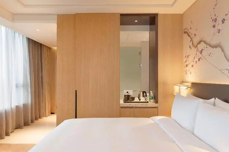 キングサイズベッドのスタンダードルーム, Hilton Garden Inn Dandong