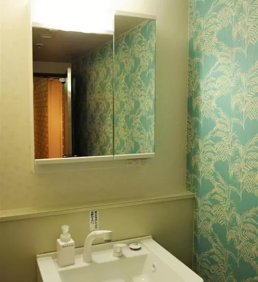 ルームシェアのワンベッド, K S House Hokkaido  Asahidake Onsen Hostel
