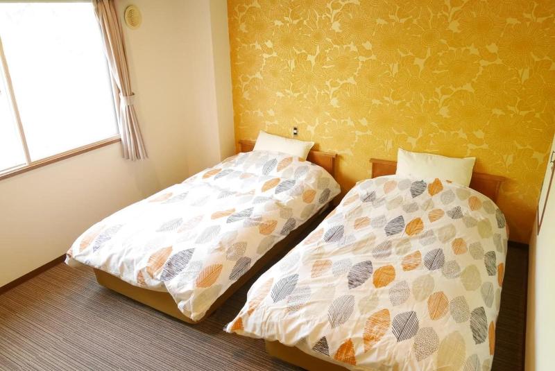 Номер Economy, K S House Hokkaido  Asahidake Onsen Hostel